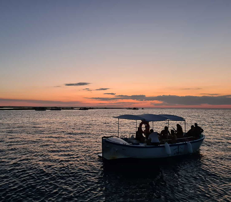 Giro in barca con tramonto a Gallipoli